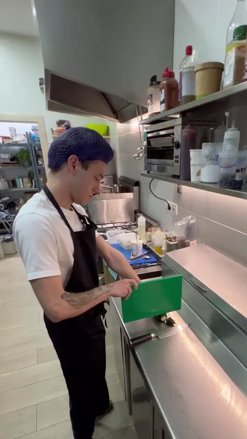 Hard work with trainee in the kitchen.