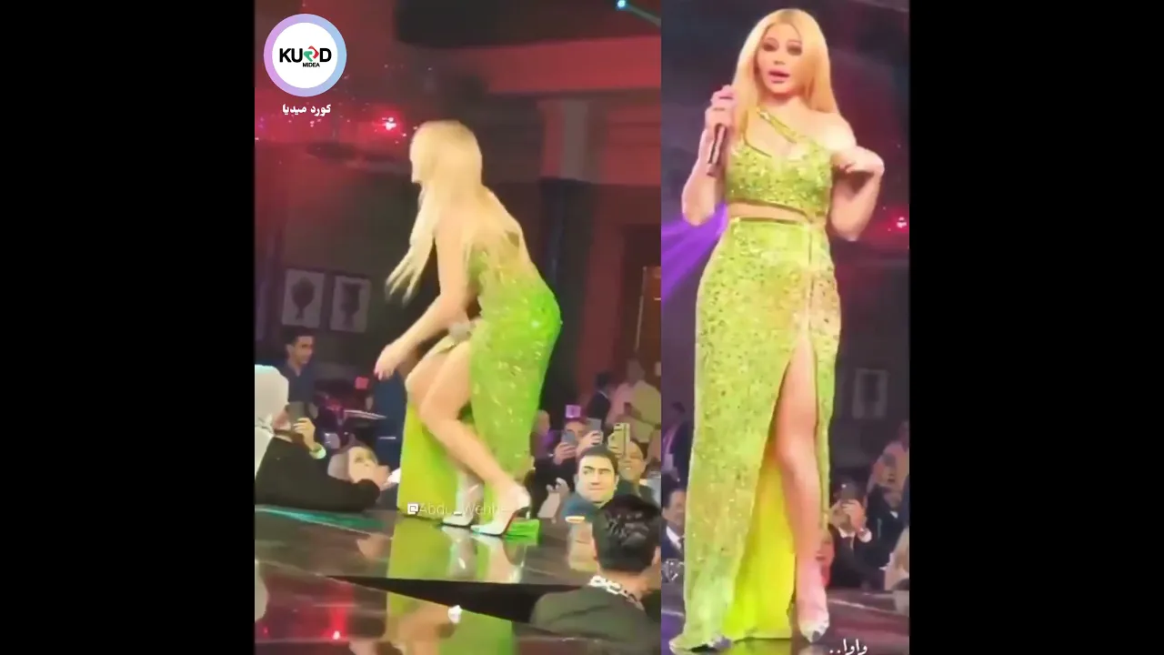 هه‌یفا له‌ كۆنسێرتێكدا ئه‌كه‌وێته‌ سه‌ر چۆك و هاوادارێكی ماچ ئه‌كات ..