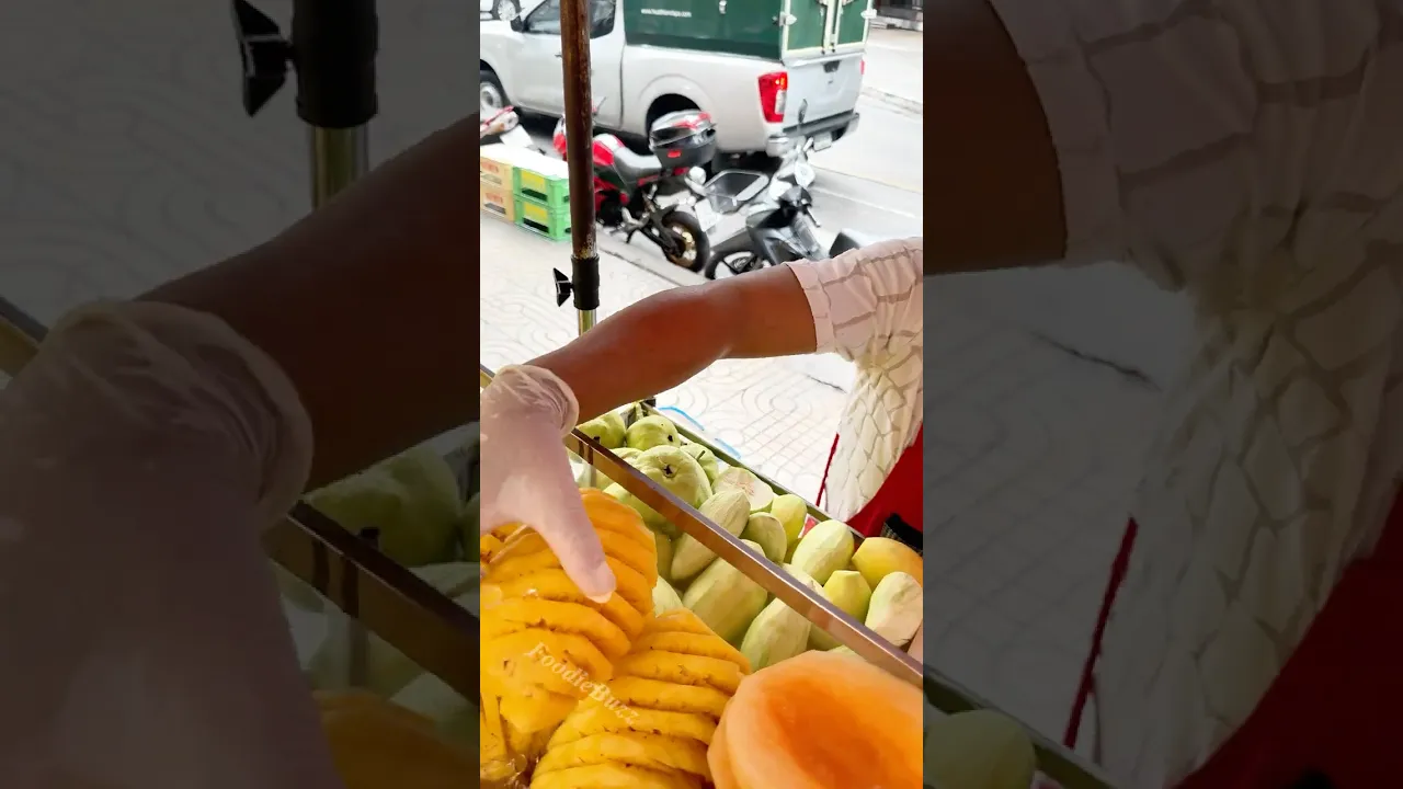 Street Vendor Fresh Fruit Cutting in Bangkok