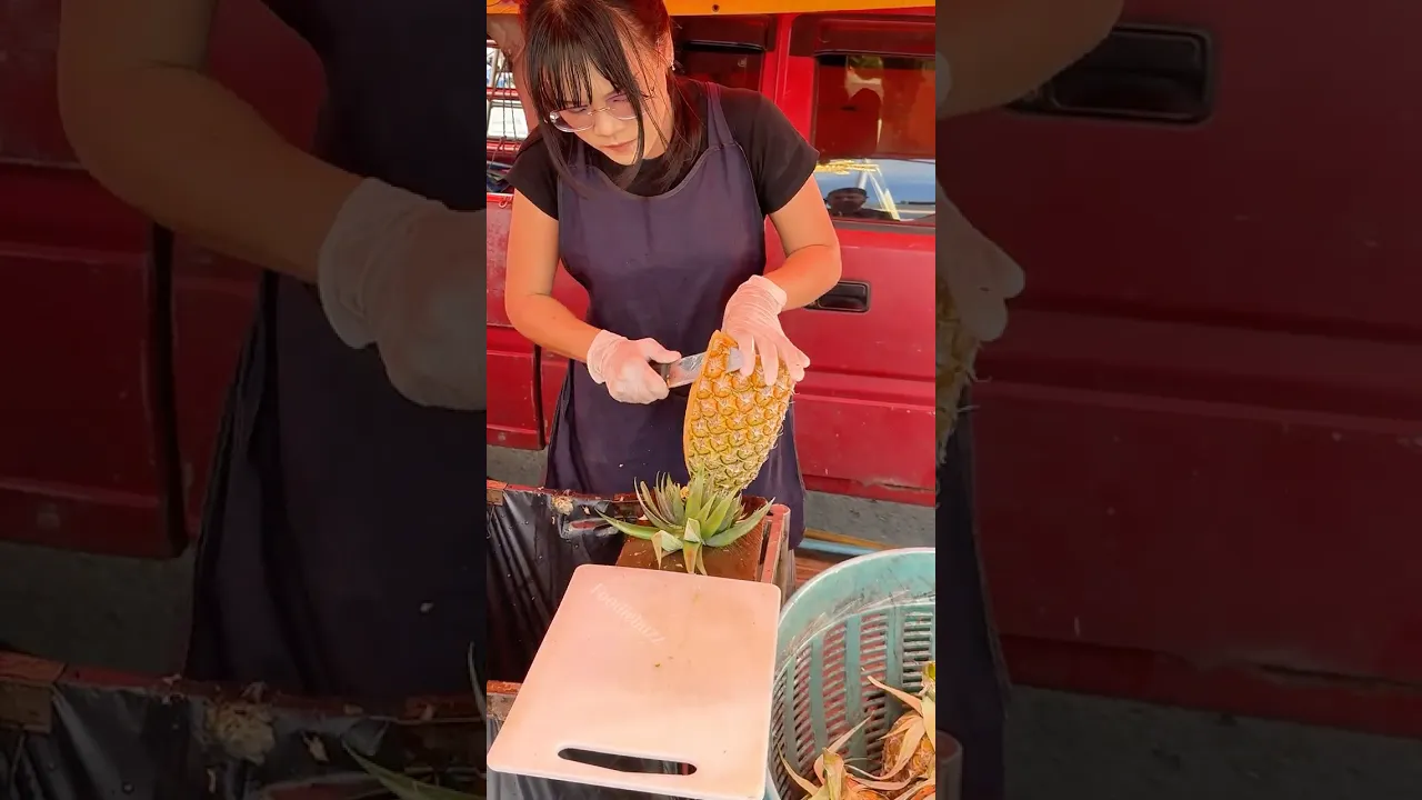 So Fast! Thai Girl Preparing Fresh Pineapple in Bangkok