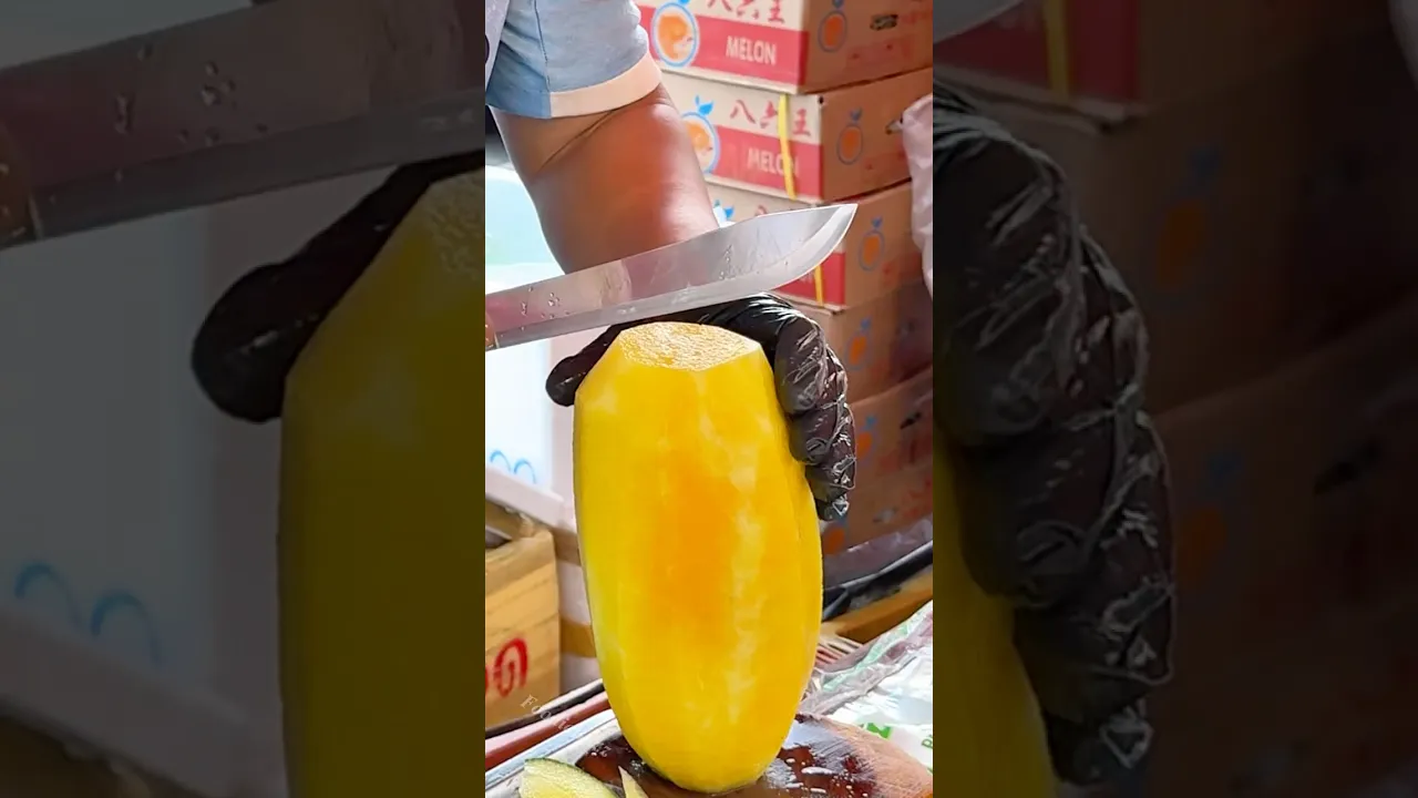Bright Yellow Watermelon Slicing in Bangkok